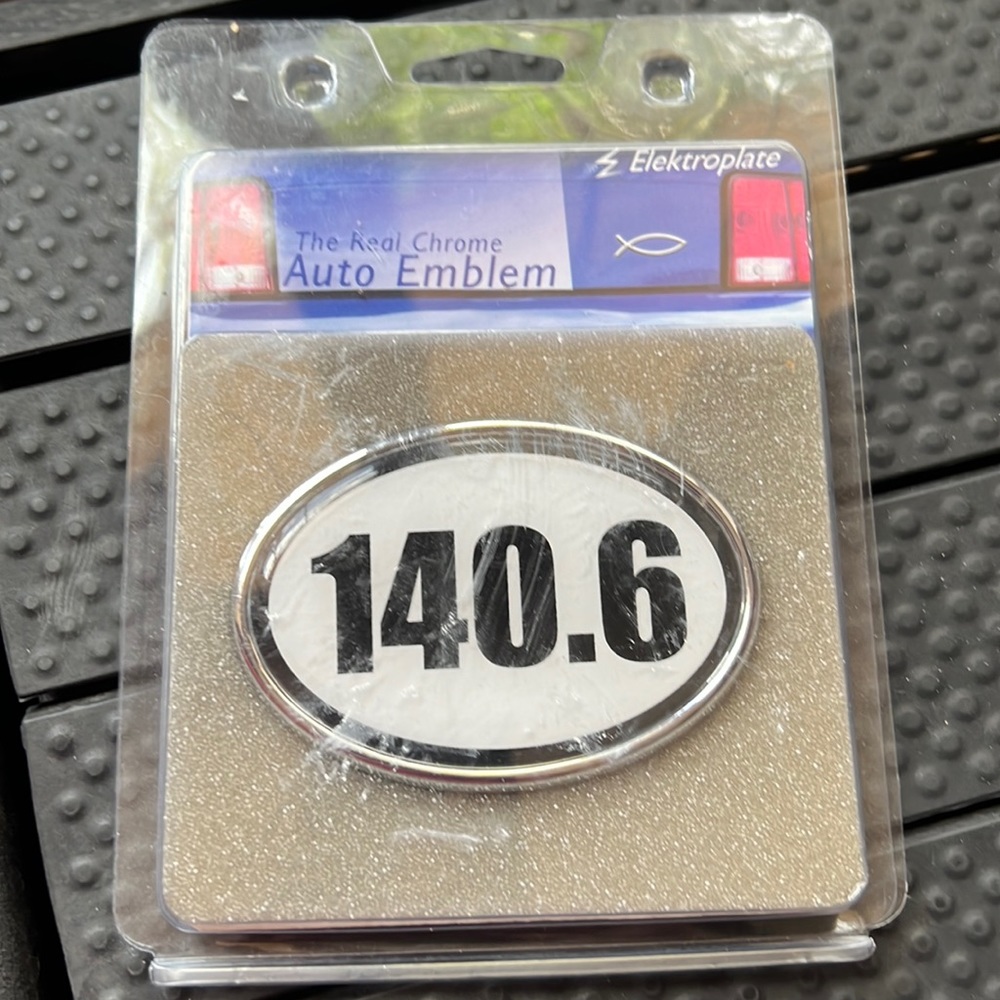 NIP 140.6 chrome auto emblem